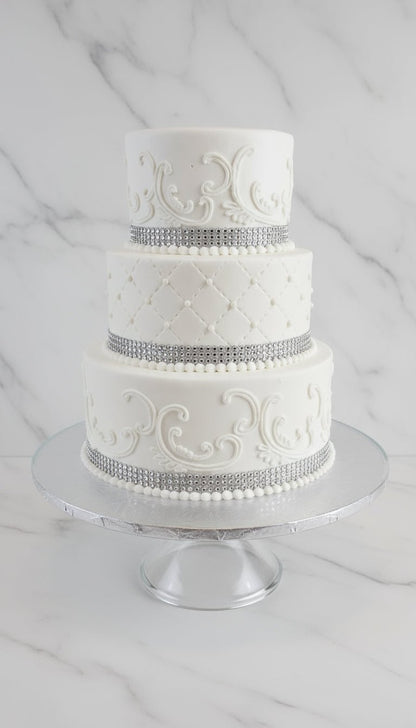 Elegant White Scroll Wedding Cake